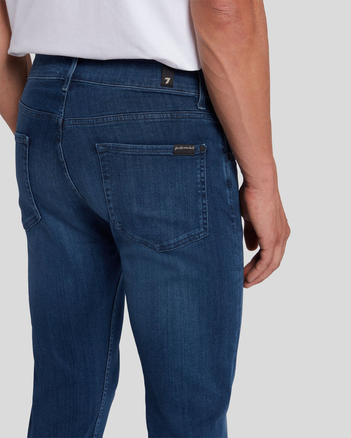 Luxe Performance Plus Slimmy Tapered In Mid-Blue